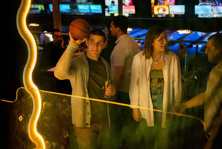 Team enjoying Stoked by Splitsville Bowl's arcade at an event