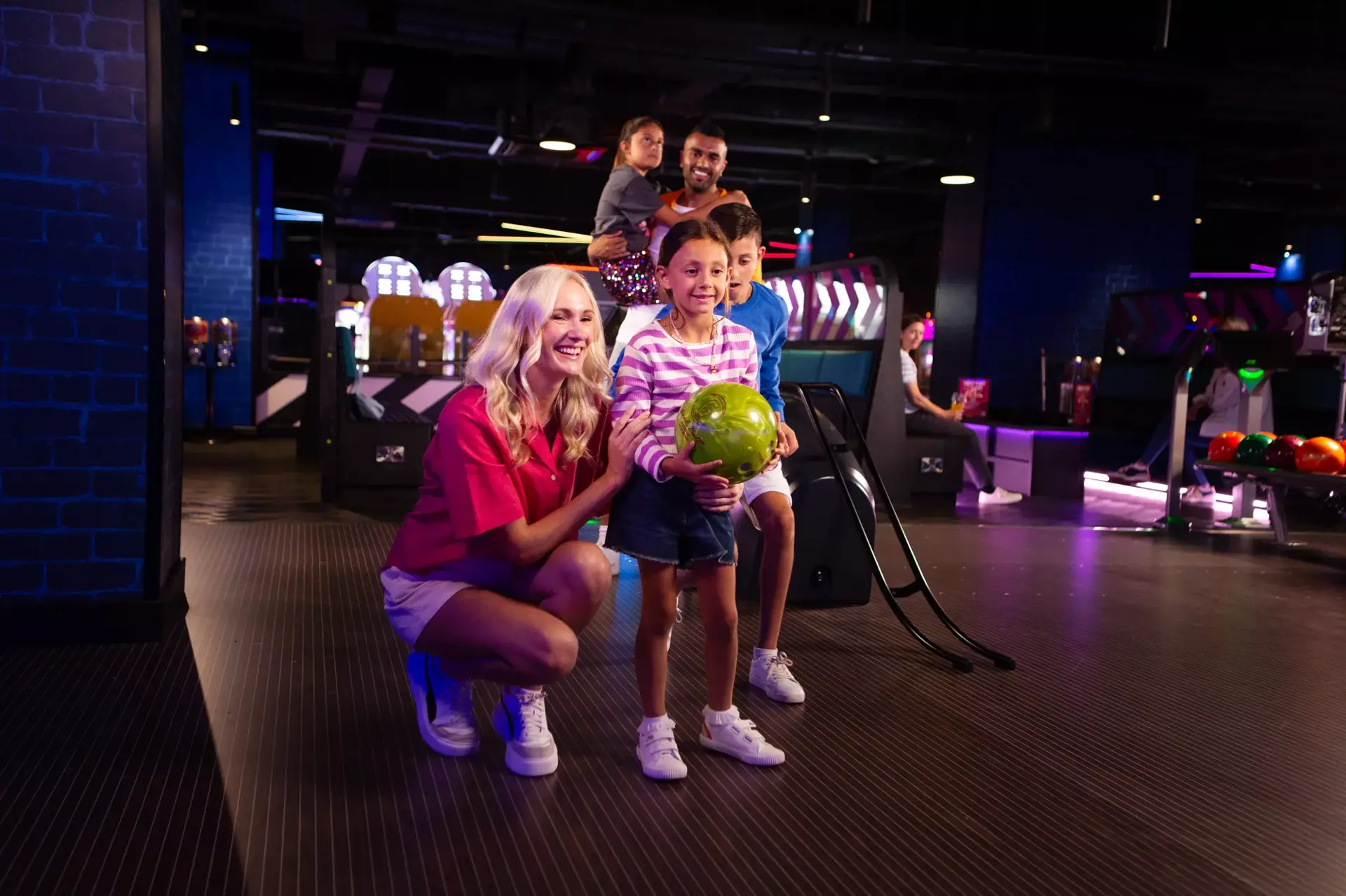 Family bowling at a Hollywood Bowl centre