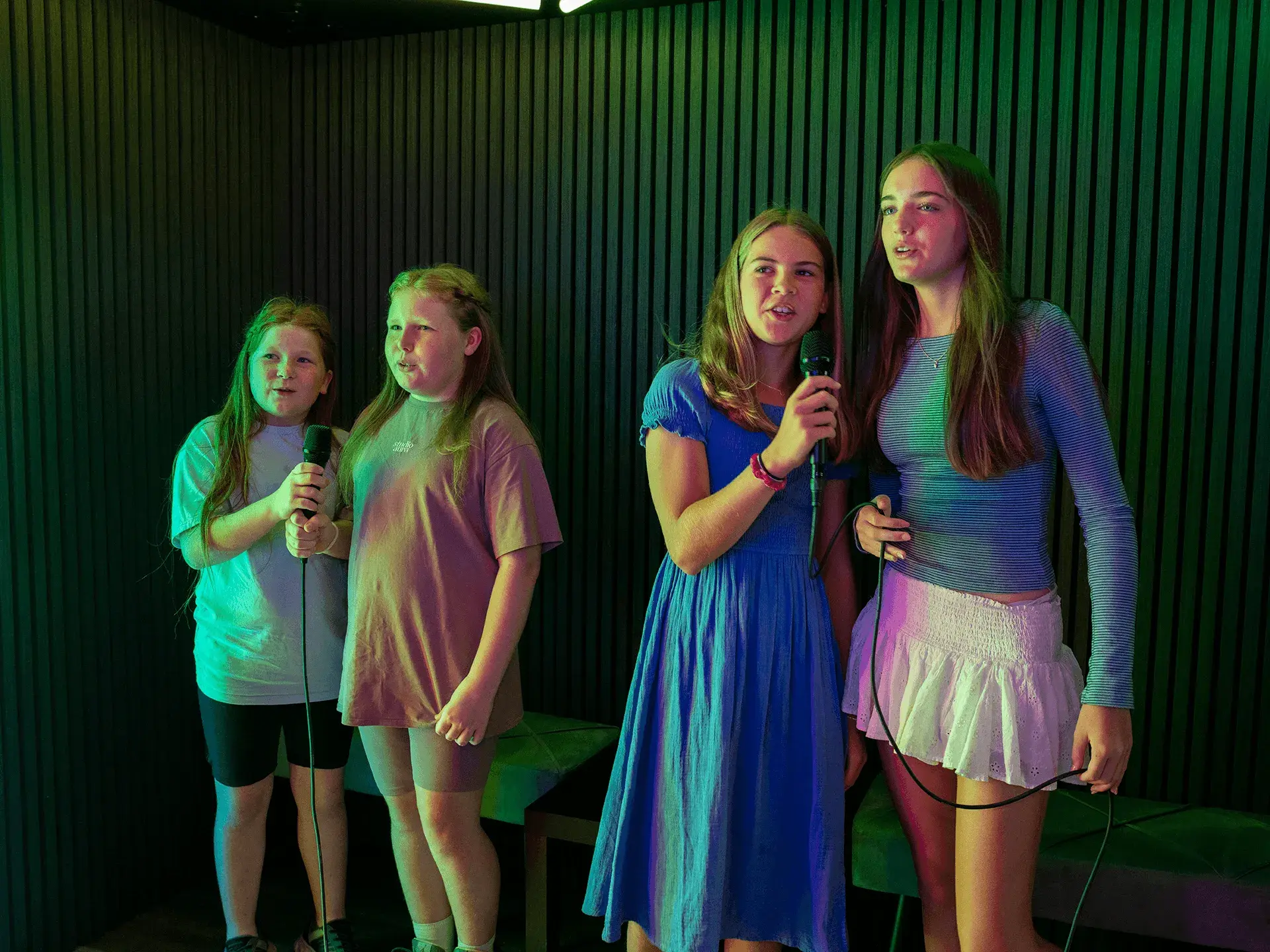 Children singing a karaoke song at Hollywood Bowl