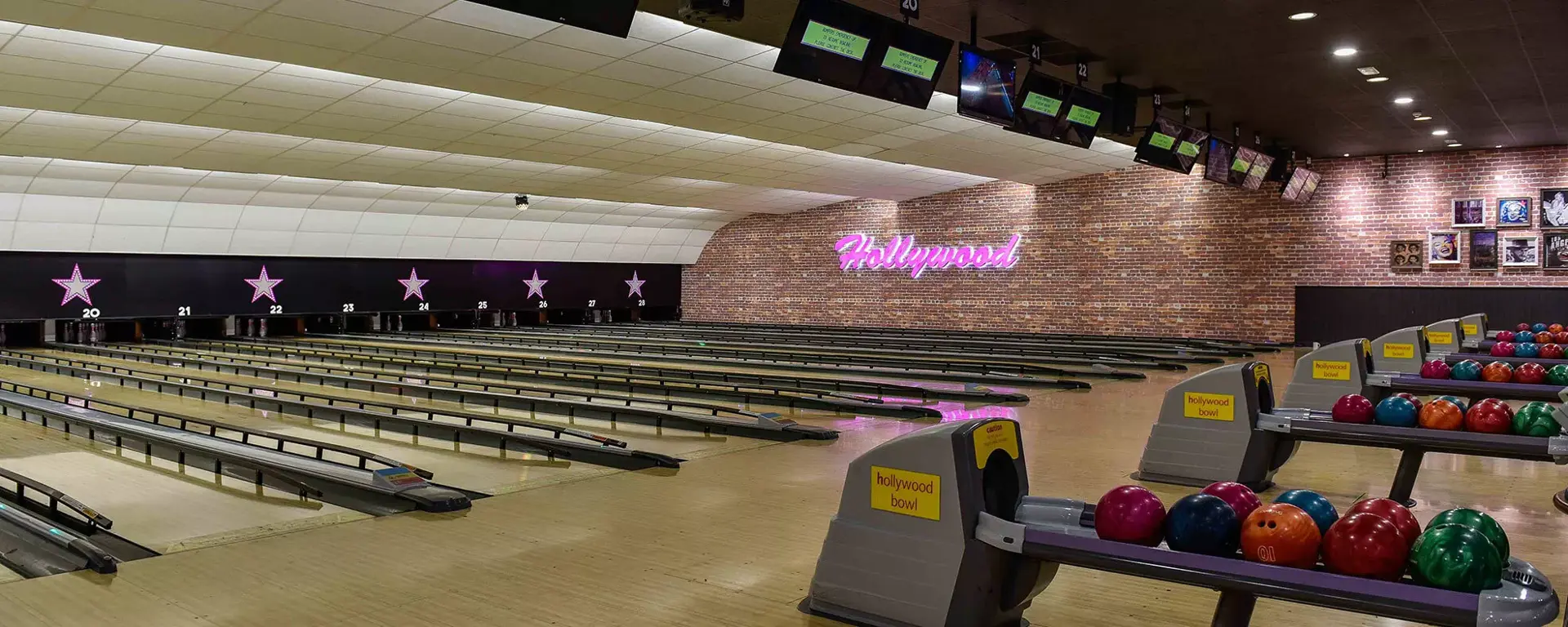Lanes and bowling balls at Hollywood Bowl Bradford
