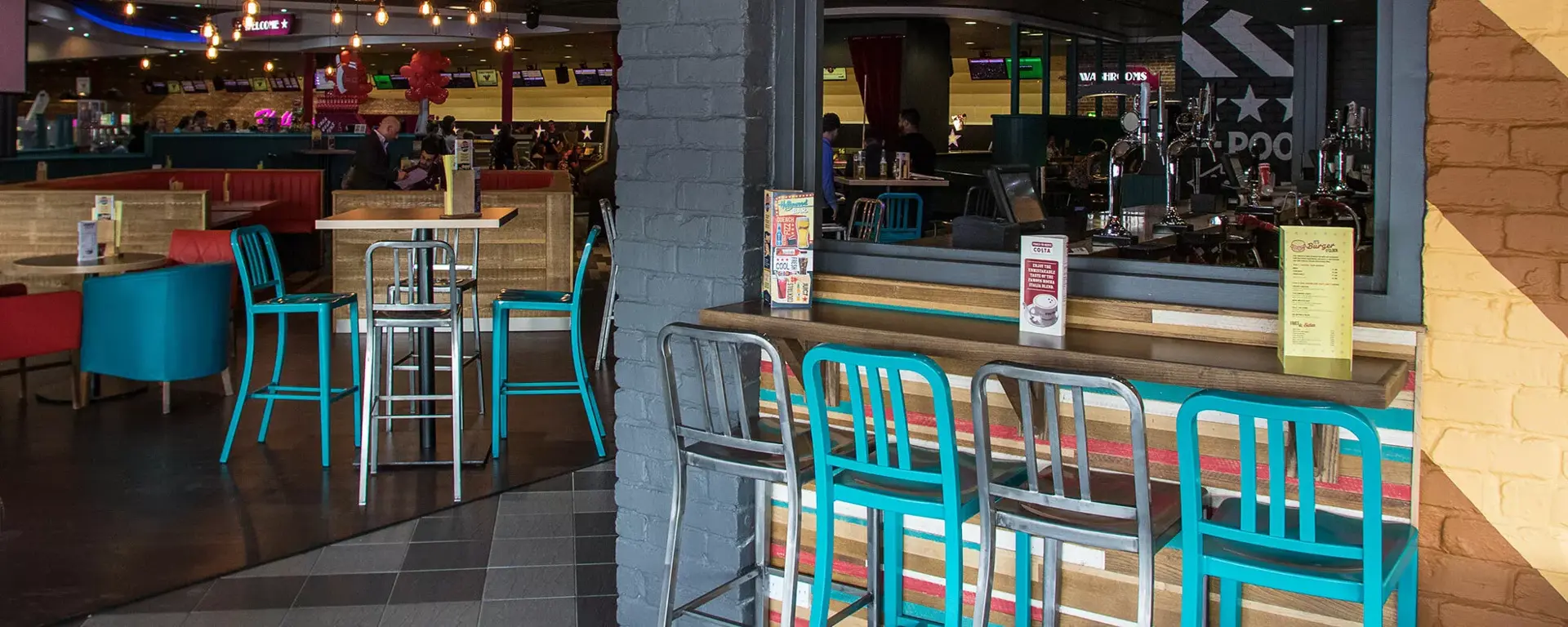 Bar and seating area at Hollywood Bowl Crawley 2