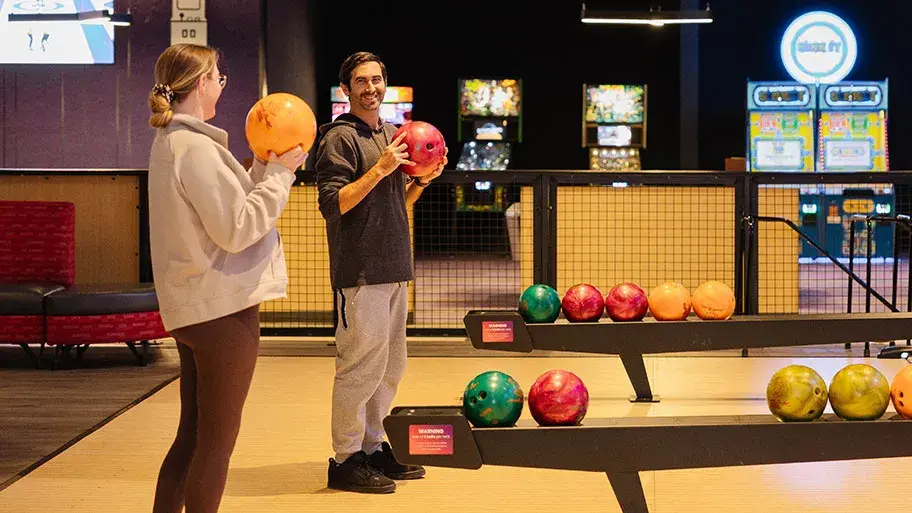 2 adults bowling at Splitsville Bowl Creekside