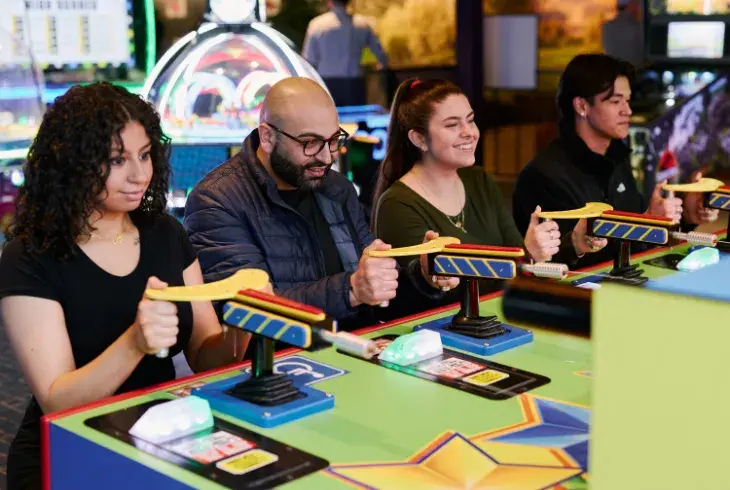 Friends Playing at Splitsville arcade