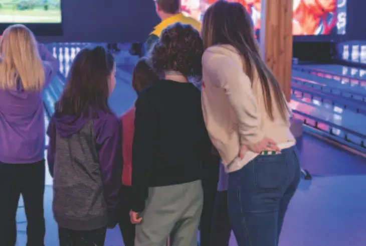 kids celebrating their wins at Splitsville