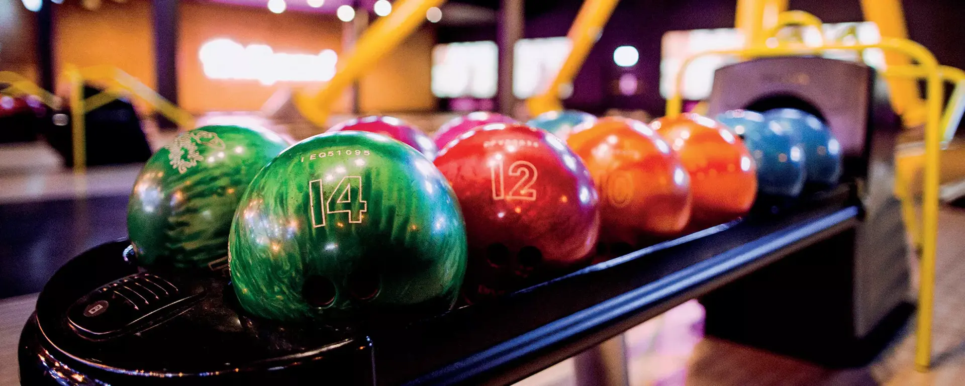Bowling balls on lanes at Hollywood Bowl
