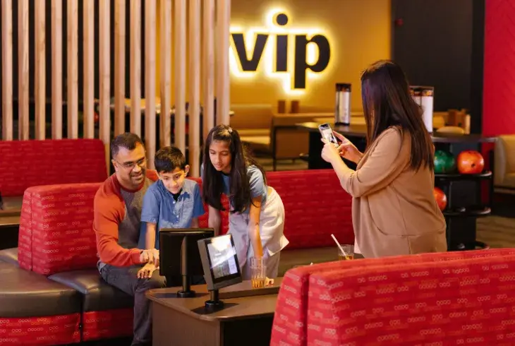Family enjoying VIP lanes at Splitsville