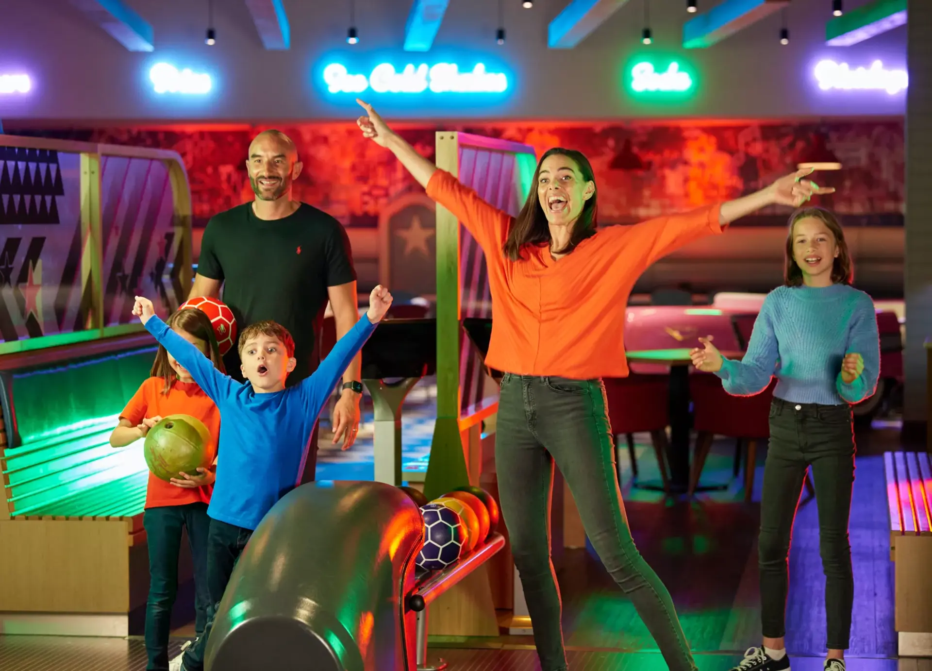 Family celebrating a strike at Hollywood Bowl