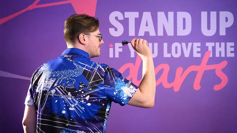 A man playing darts at Hollywood Bowl Norwich