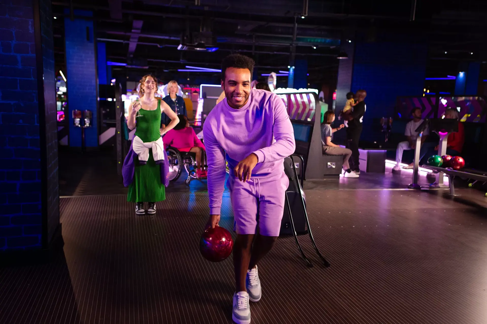 Young adults bowling at Hollywood Bowl during Easter