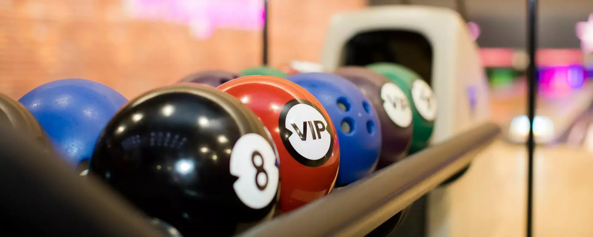 VIP bowling balls on lanes at Hollywood Bowl Ashford