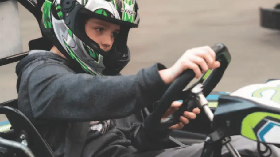 Junior go karts racing at Stoked Saskatoon