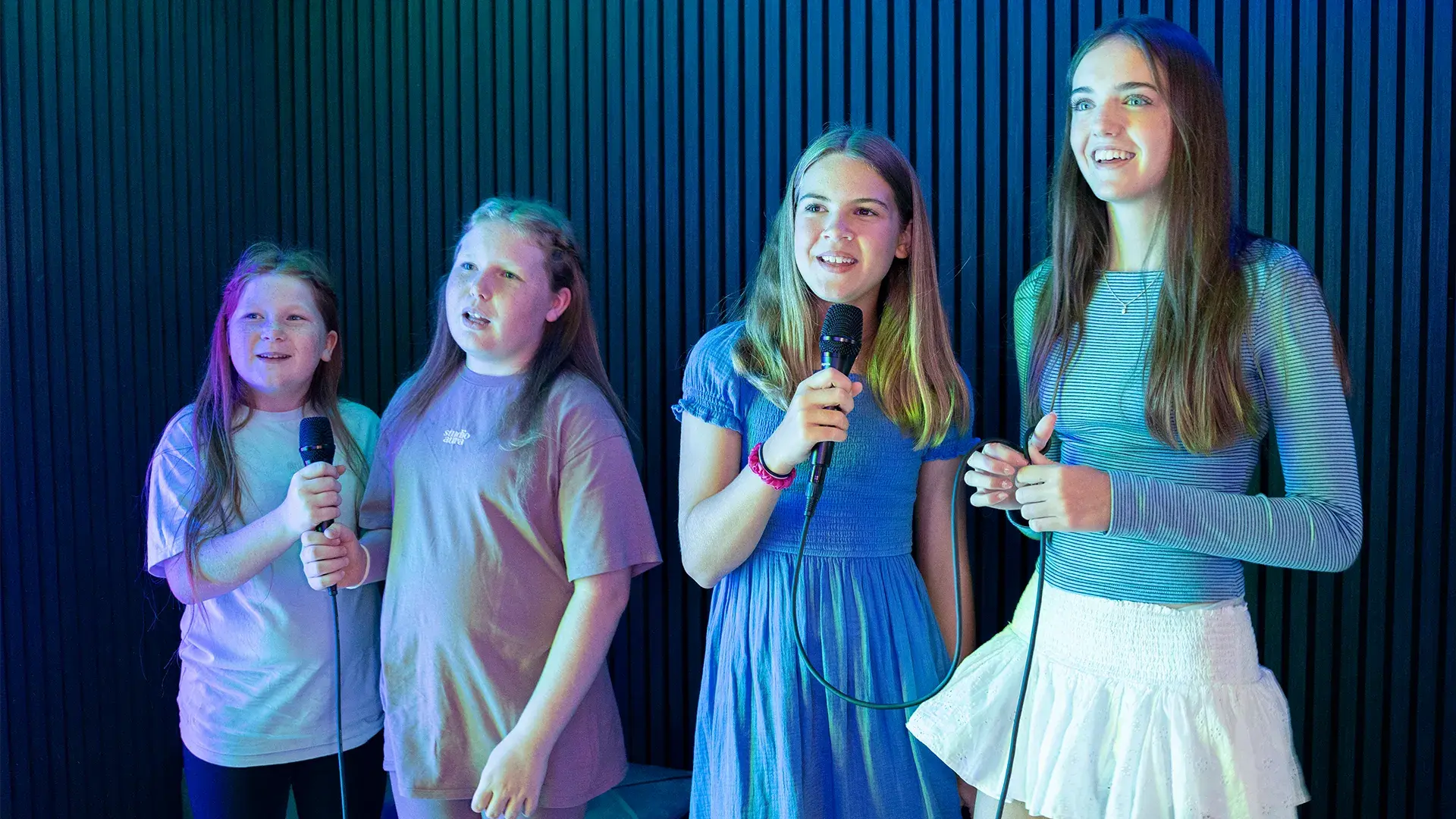 Children singing a karaoke song at Hollywood Bowl