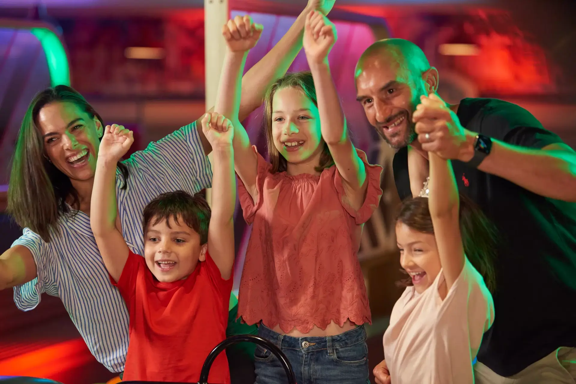 Family having fun bowling