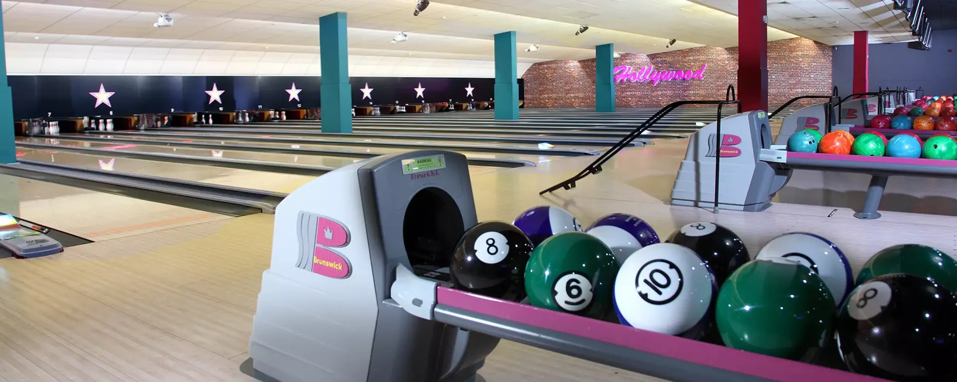 Bowling balls on lanes at Hollywood Bowl Eastleigh
