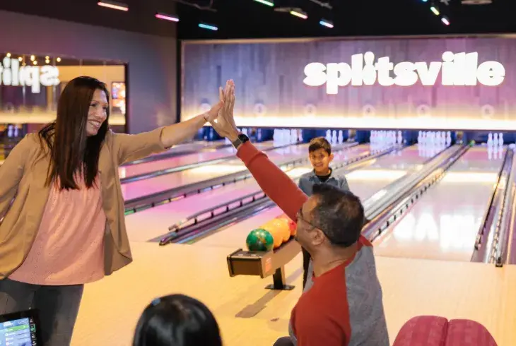 Family enjoying family-time at Splitsville fun