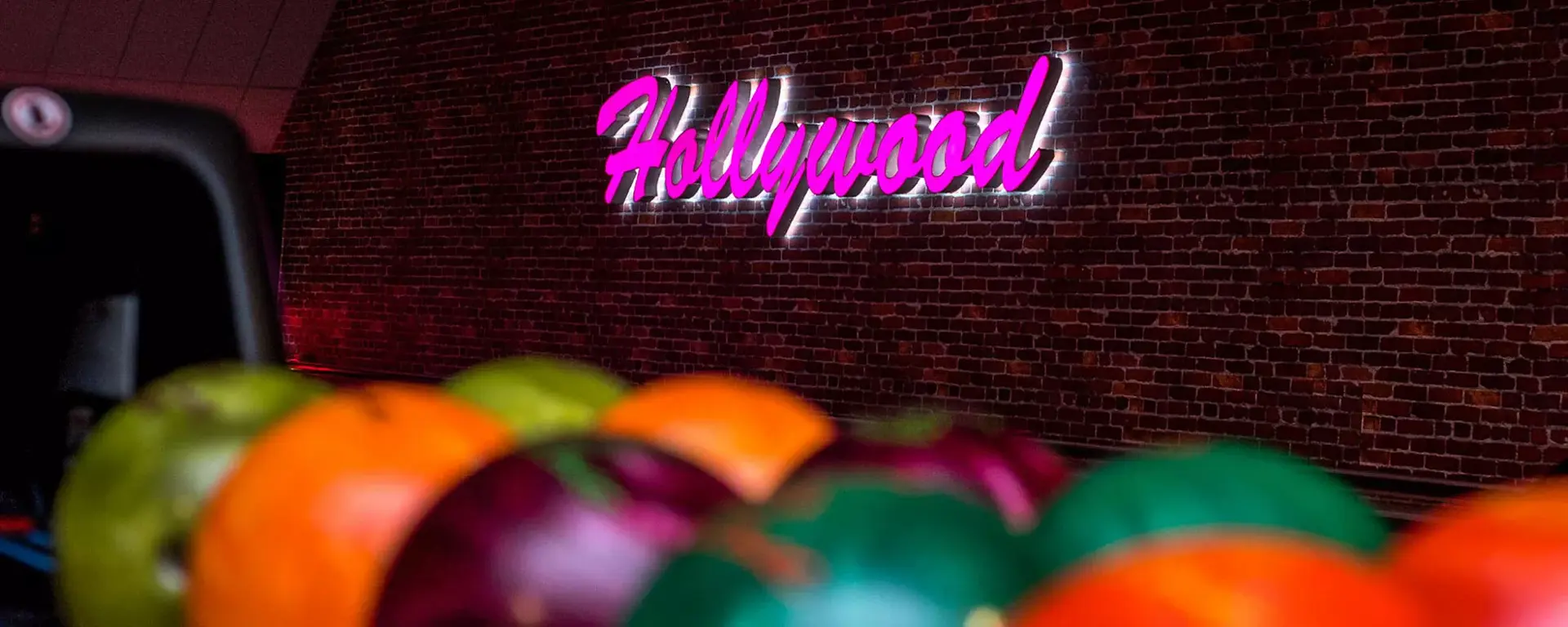 Bowling balls and Hollywood sign on lanes