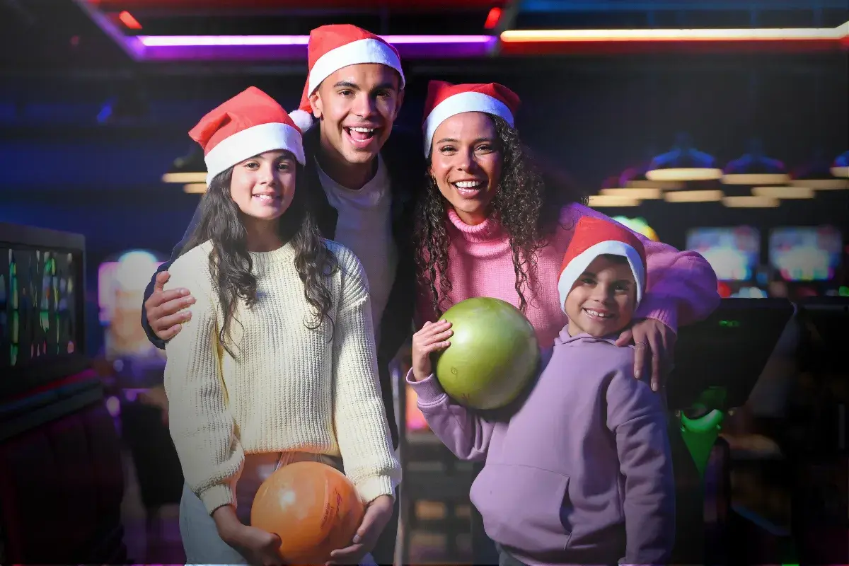 Family enjoying bowling for the holidays at Splitsville Bowl