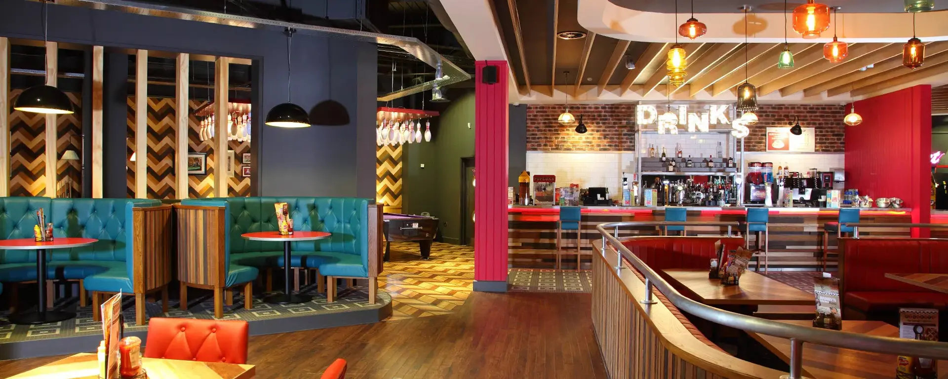 Seating and diner area at Hollywood Bowl Cheltenham