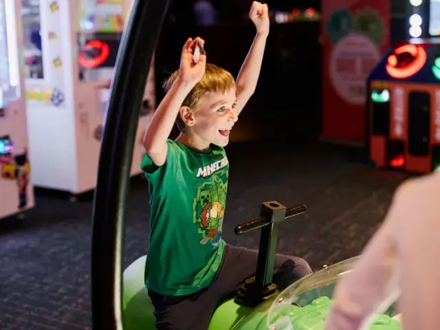 kids celebrating their wins at Splitsville