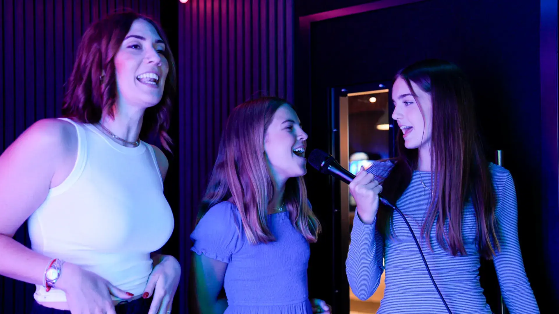 Children singing a karaoke song at Hollywood Bowl